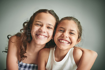 Buy stock photo Portrait, happy children and hug for oral care, together and bonding by wall as family. Smile, kids and siblings with confidence for teeth and health for hygiene, dental and wellness in home