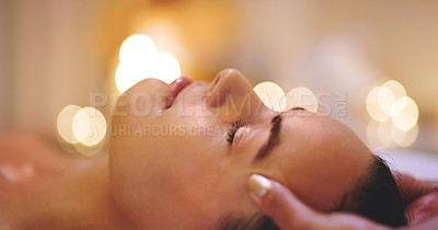 Buy stock photo Closeup shot of a beautiful young woman enjoying a head massage at a beauty spa