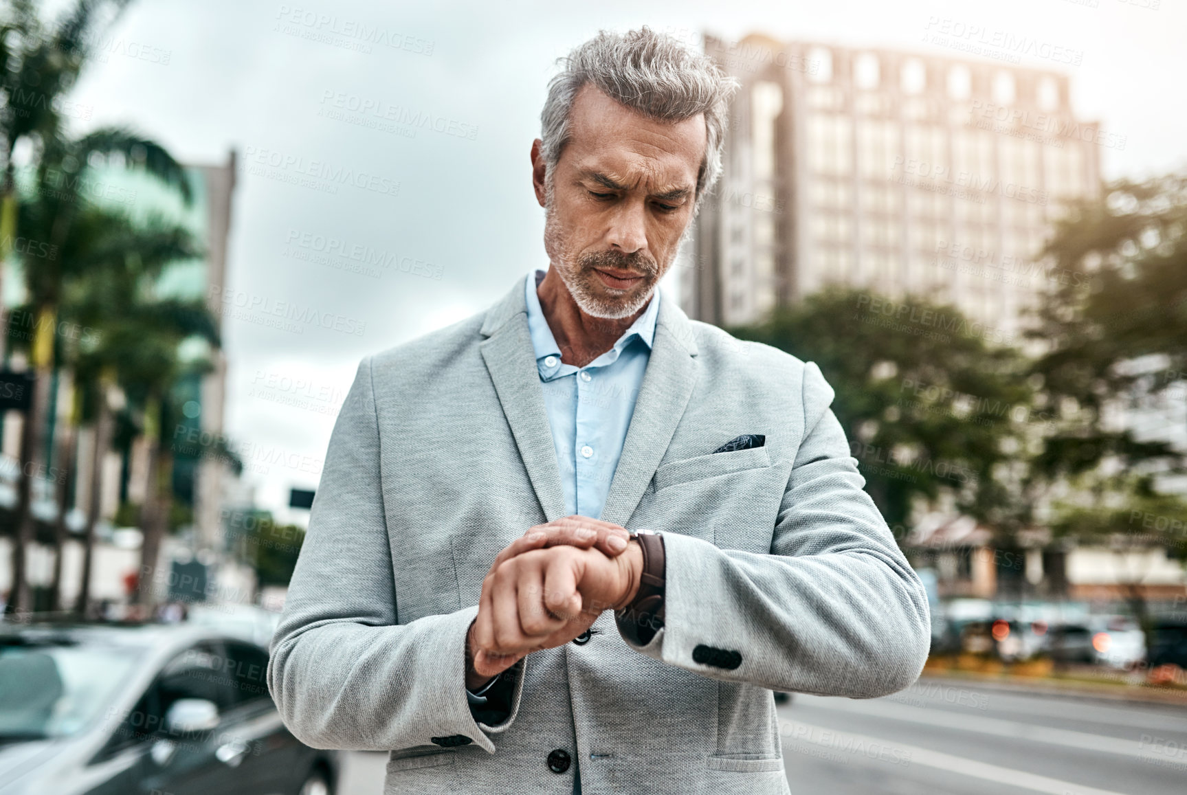 Buy stock photo Mature, businessman and checking time with thinking in city as real estate agent for morning commute. Male person, outdoor and running late for planning, travel or career in property investment in UK