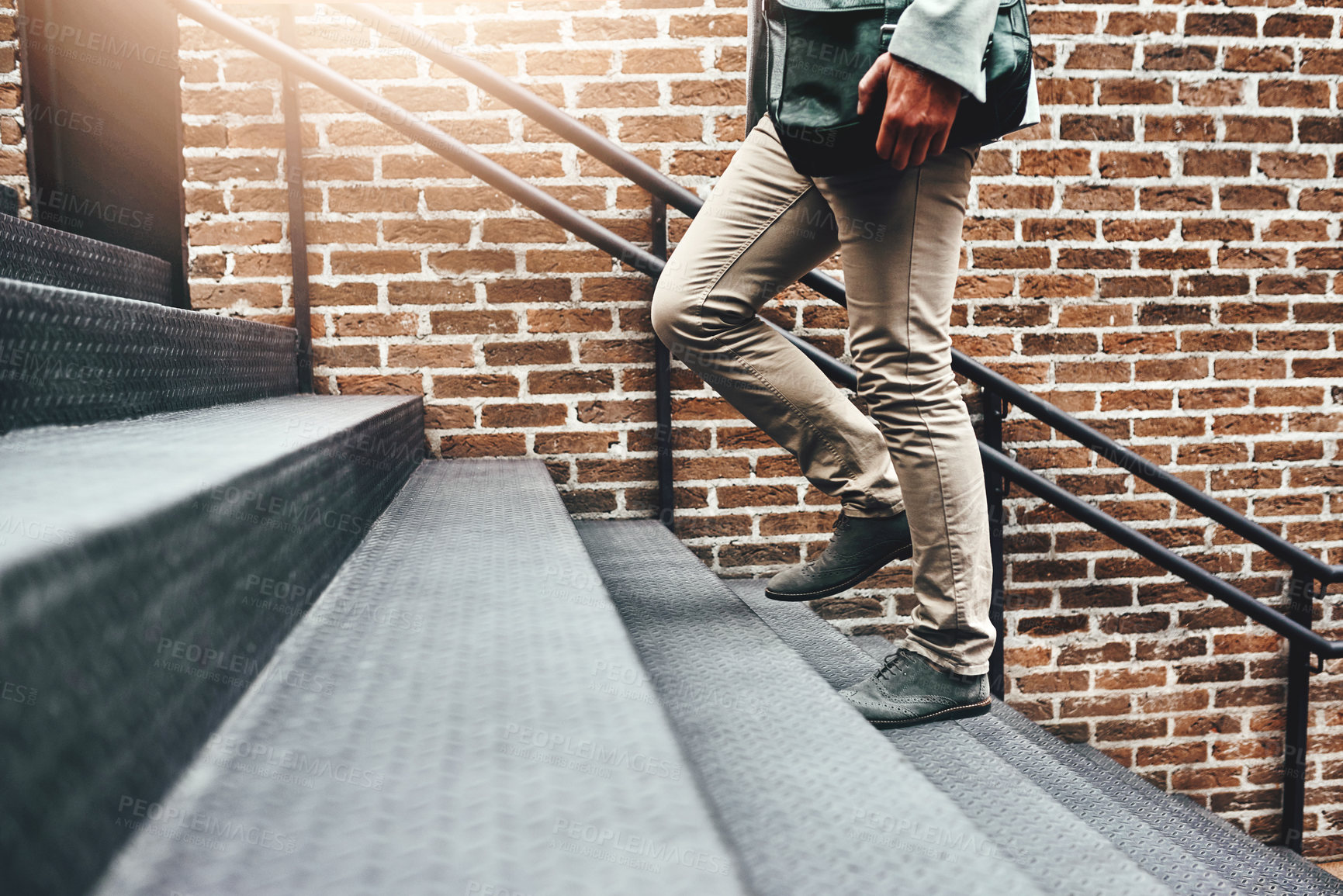 Buy stock photo Businessman, legs and walking in city, steps and commute in urban town to workplace. Male person, shoes and professional on journey to opportunity, outdoor and employee travel on stairs to metro