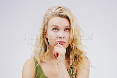 Buy stock photo Young woman, thinking and remember in studio with ideas, memory and focus by gray background. Girl, model and think with doubt, confused and decision for choice, planning and question with mindset