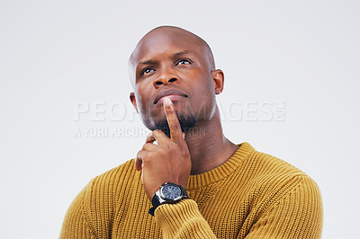 Buy stock photo Thinking, idea and a black man with focus for a decision isolated on a white background in a studio. Planning, young and an African person with ideas, remember plan and a choice on a backdrop
