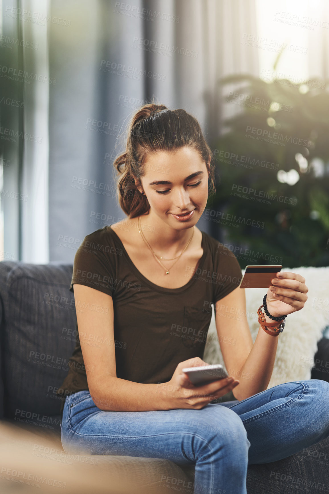 Buy stock photo Relax, mobile and girl with credit card on sofa for online shopping, e commerce or transaction in living room. Payment, app and young woman for purchase, subscription or internet banking in home