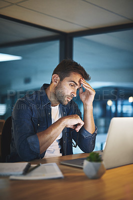 Buy stock photo Businessman, headache and tired of reading on laptop
with stock market crash, burnout or overworked. Employee, stress and migraine at desk in office for investment mistake and economy crisis at night