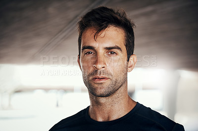 Buy stock photo Serious, portrait and man breathing in workout, exercise or training at gym or athlete, sports and healthy fitness with confidence. Male person, face and sweat or focus on cardio or wellness routine 