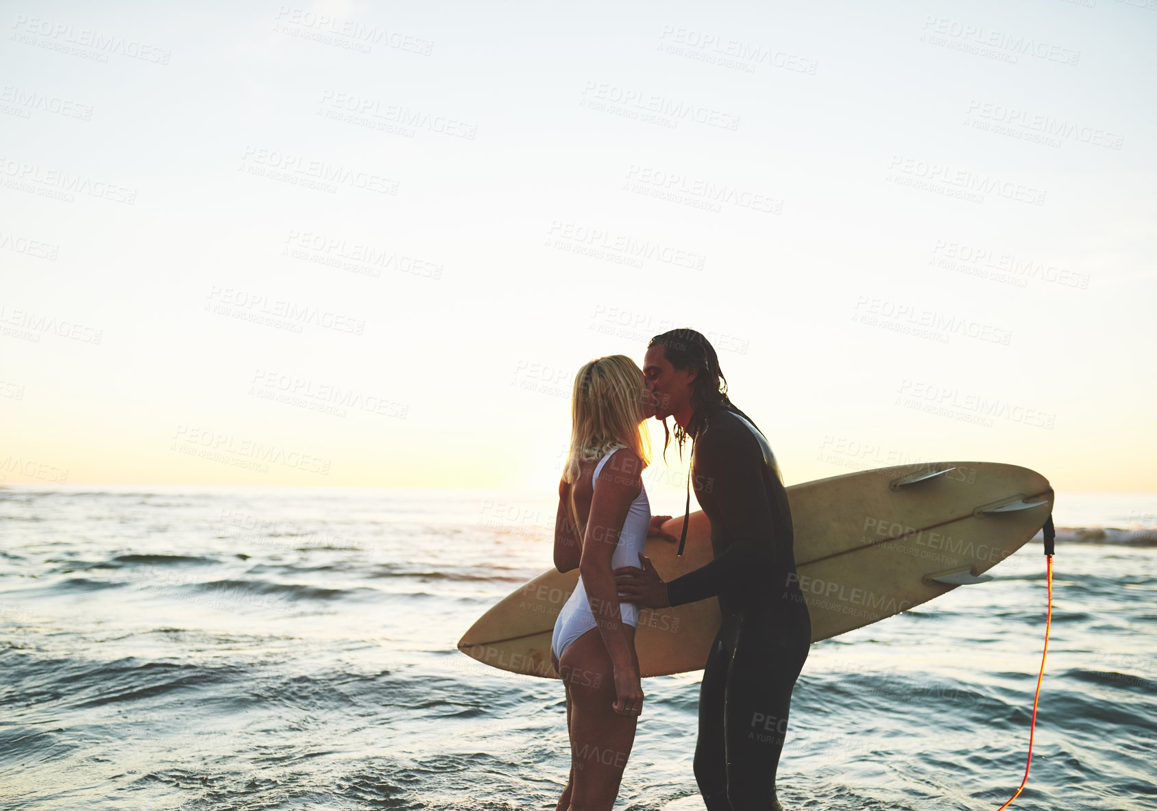 Buy stock photo Beach, couple and kiss with surfboard for love in bonding, break and memories in Australia. People, relationship and affectionate with sports for fitness, exercise and training with care and support