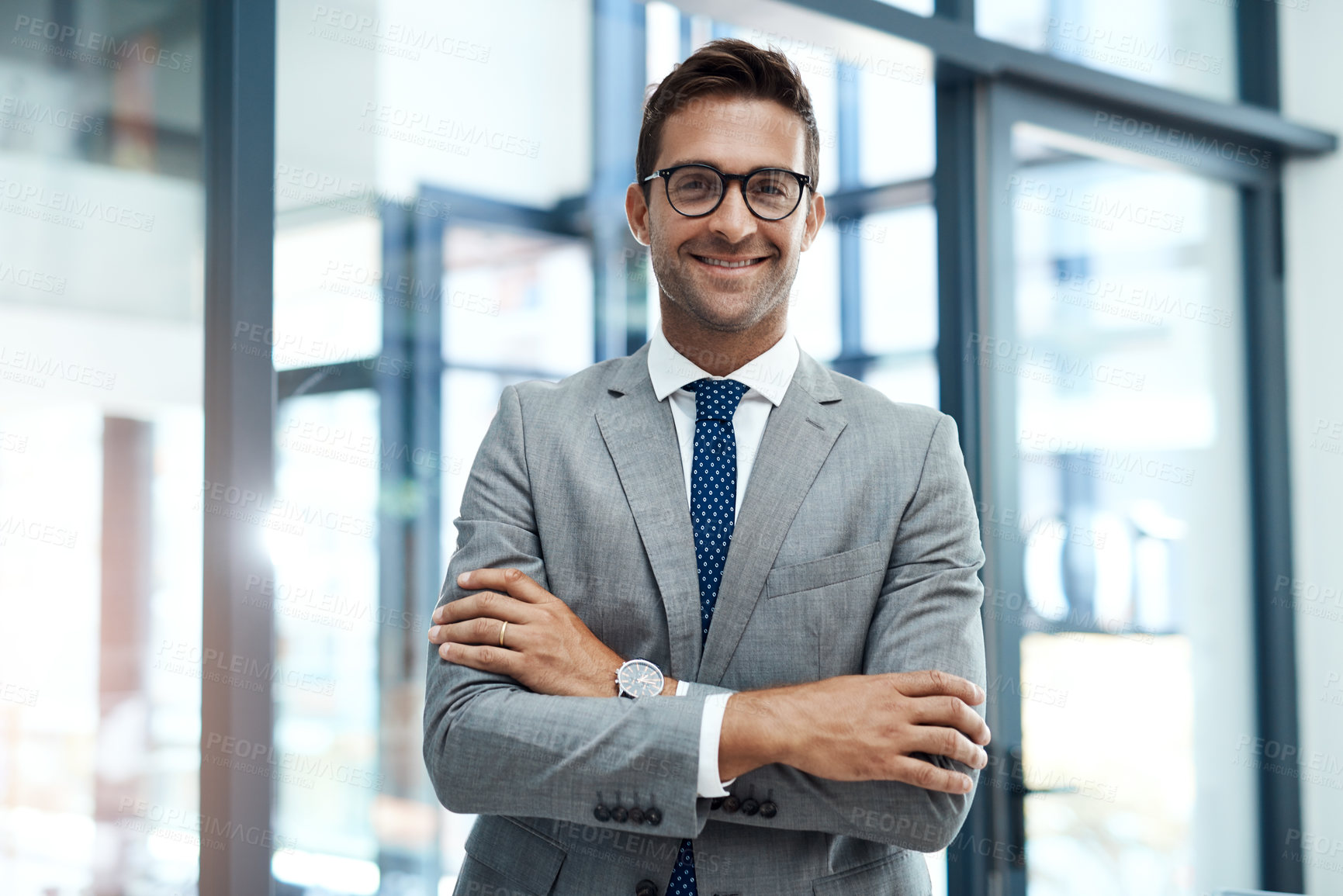 Buy stock photo Portrait of a well-dressed businessman standing in his office