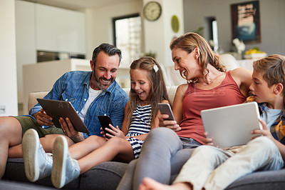 Buy stock photo Technology, streaming and a happy family on the sofa for internet, social media and communication. Smile, bonding and a mother, father and children with a tablet and phone for online games at home