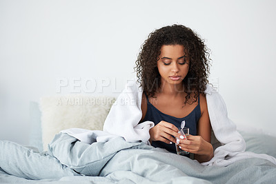 Buy stock photo Sick, woman and bedroom for rest, home and relax for comfort, calm and medication for health. Female person, morning and break for self care, wellness and pills in house with water, wake up and fever