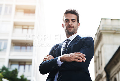 Buy stock photo Portrait of a handsome young businessman on his morning commute to work