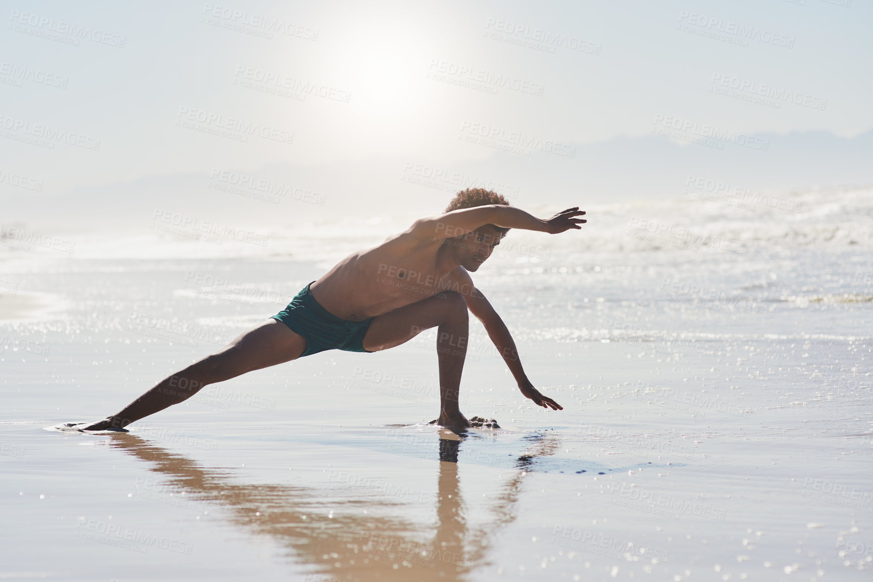 Buy stock photo Contemporary, dancing and man on beach with movement for choreography, balance or competition training. Body, sunshine and male person by seashore for workout, performance arts and routine in Jamaica