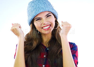 Buy stock photo Portrait of a young woman posing against a white background