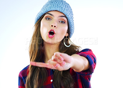 Buy stock photo Portrait of a young woman posing against a white background