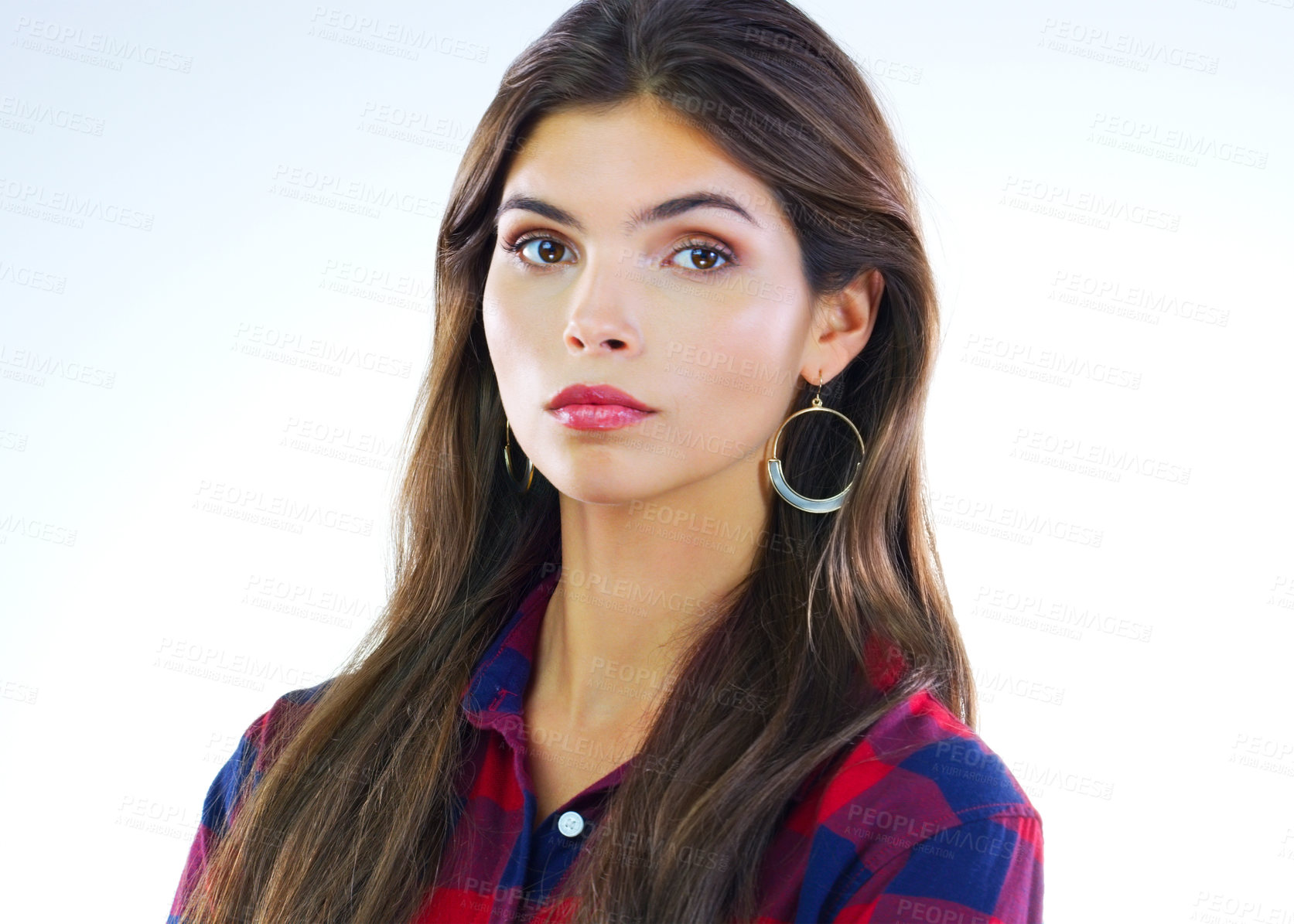 Buy stock photo Cropped shot of a young woman posing against a white background