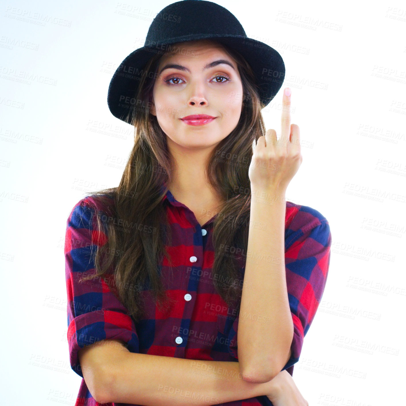 Buy stock photo Cropped shot of a young woman showing middle finger against a white background