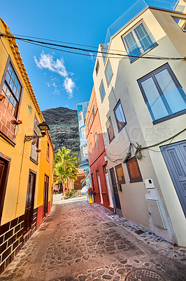 Buy stock photo Scenic view of old historic houses, residential buildings, traditional infrastructure in small alleyway, street, road. Tourism, travel destination abroad and overseas in Santa Cruz de La Palma, Spain