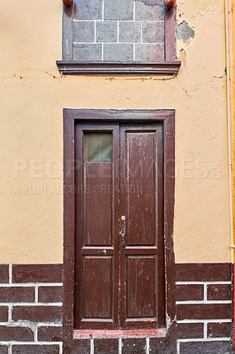 Buy stock photo Old house or church with peeling paint on wall or window and wooden shutter door. Vintage and aged residential building built in a traditional architectural style or design in Santa Cruz de La Palma