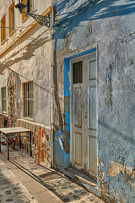 Buy stock photo The exterior of an old style building, looking weathered with peeling paint. Architecture details of vintage, rustic structure in old fashioned town of de La Palma. Modern living in old buildings 