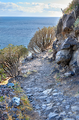 Buy stock photo Mountain, trail and landscape with path, ocean and horizon with ecology and growth in Spain. Travel, tourism and la palma with blue sky, environment and sustainability for outdoor hiking destination