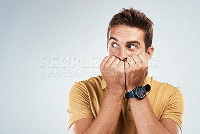 Buy stock photo Man, scared and nervous in studio for news, anxiety and suspense for announcement on white background. Male person, worry and phobia for risk or panic for nightmare, information and mockup space