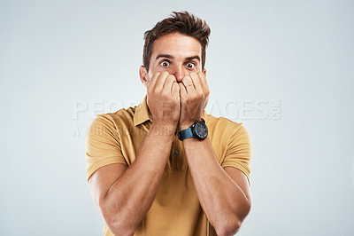 Buy stock photo Man, scared and nervous in studio portrait, anxiety and suspense for announcement on white background. Male person, worry and phobia for risk or panic for nightmare, information and paranoid terror