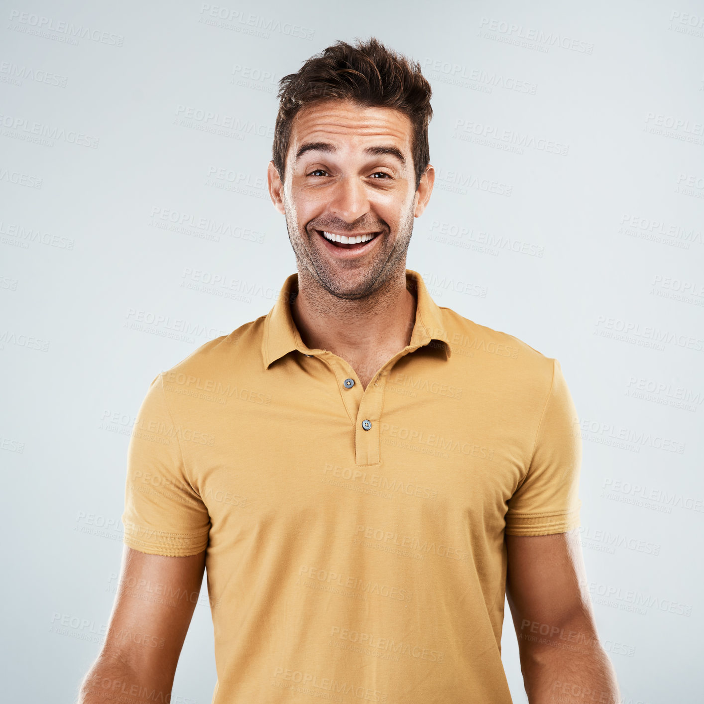 Buy stock photo Man, portrait and happy in studio for surprise, excited and pleased for good news. Male person, smile and wow on gray background for winner, competition results and amazing deal in casual fashion