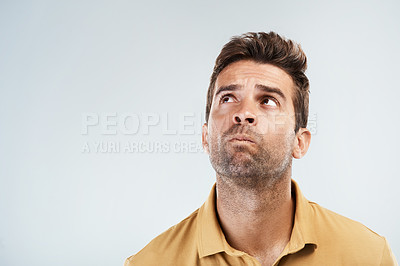 Buy stock photo Confused, man and thinking in studio for solution, problem solving and unsure with space for question or answer. Male person, thoughts and idea on white background with confusion, pensive and choice.