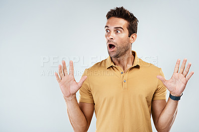 Buy stock photo Man, shock and terror in studio for alarm, stress and suspense for announcement on white background. Male person, scared and hands for wtf on mockup space, nervous drama and surprise for conflict