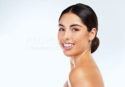 Buy stock photo Studio shot of beautiful young women posing against a grey background 