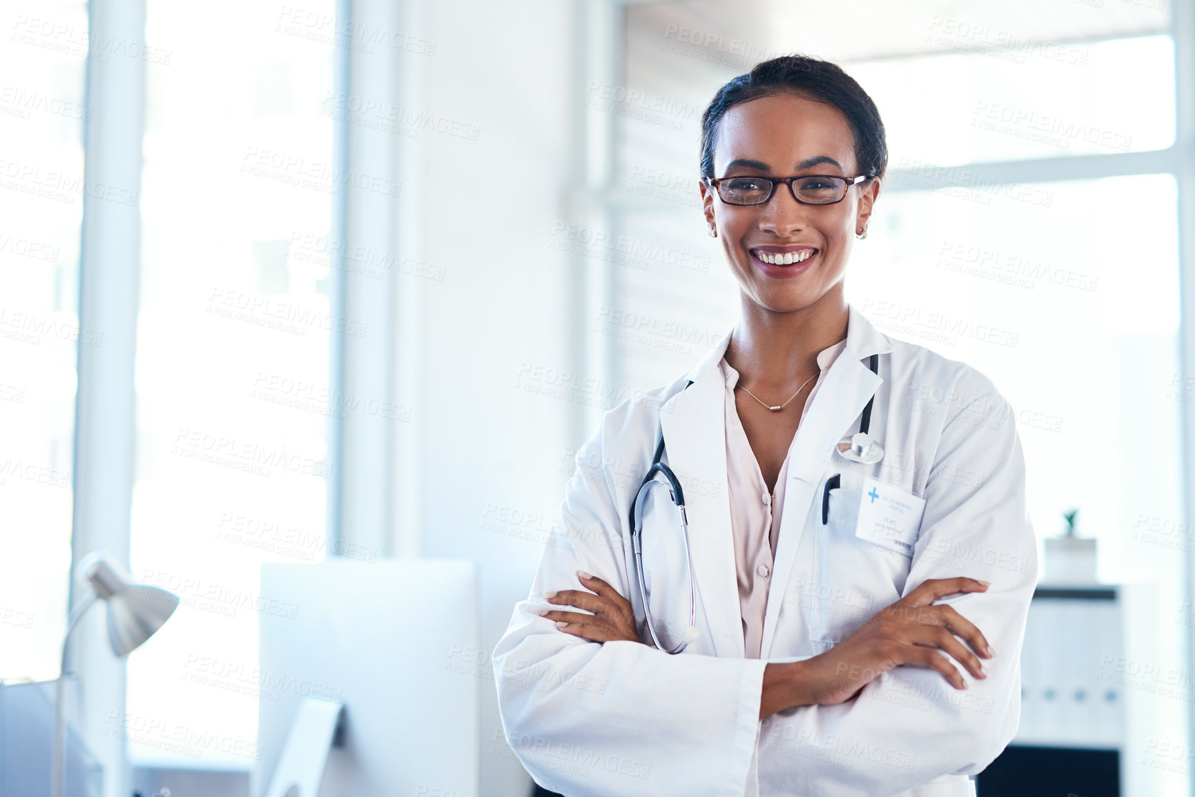 Buy stock photo Doctor, portrait and confidence in hospital for healthcare, medical consulting and cardiology advice. Black woman, happy and crossed arms in clinic for wellness, health and experience in medicine