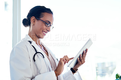 Buy stock photo Doctor, hospital and happy woman on tablet for research, information and healthcare update. Technology, medical professional and check schedule, report or reading results on internet with good news