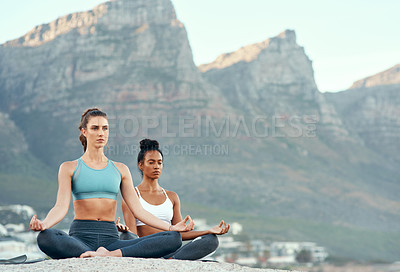 Buy stock photo Fitness, meditation and yoga with friends on beach for mental health, peace or wellness in morning. Exercise, training and zen with women on space at coast by ocean or sea for balance and mindset