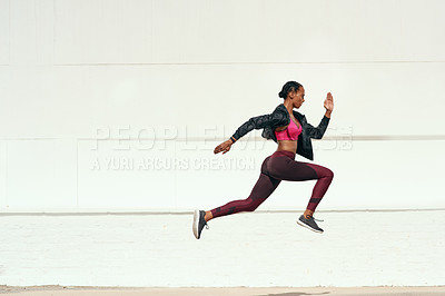 Buy stock photo Woman, fitness and running jump action on mockup for cardio training, exercise or workout outdoors. Fit, active and sporty female person or runner exercising for health and wellness on mock up space