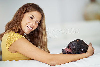 Buy stock photo Sofa, portrait and woman with dog for bonding, connection and companion with happiness in living room. Home, female person and pet care with stroke for animal, labrador and loyalty with love in couch