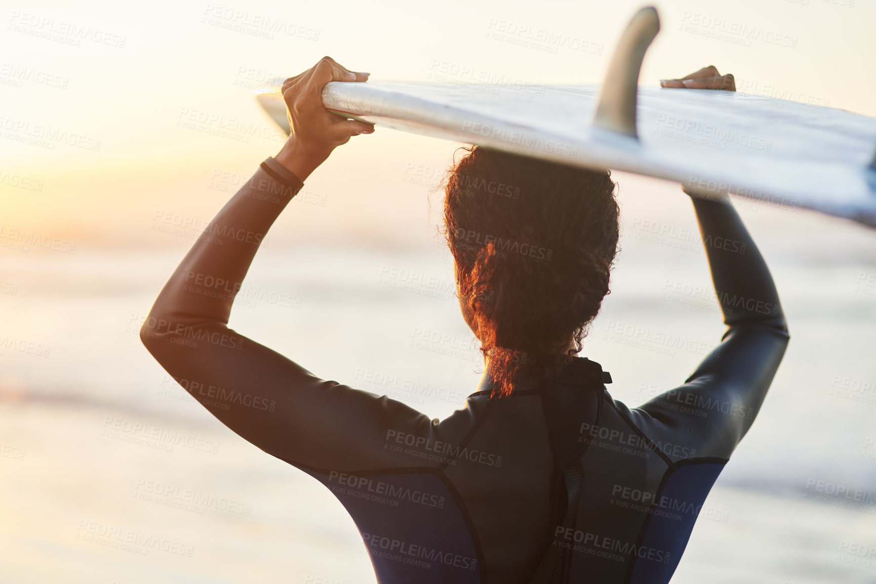 Buy stock photo Beach, sunset and back of girl with surfboard for training, wellness and summer, sports or adventure in nature. Fitness, journey or woman surfer at the ocean with freedom, fun and workout at the sea