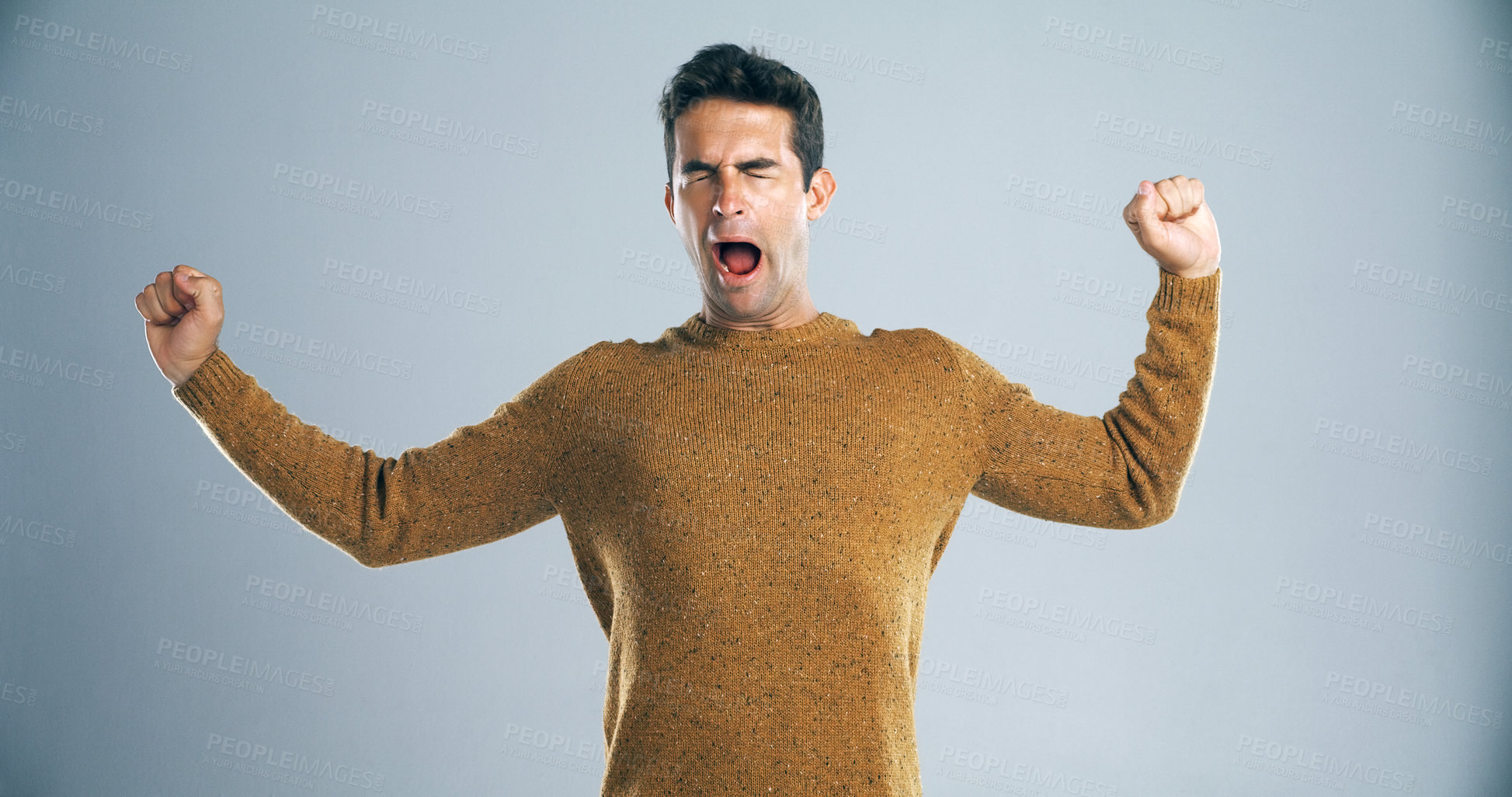 Buy stock photo Man, tired and yawning with stretching in studio for burnout, exhausted and low energy on mockup space. Sleepy person, fatigue and eyes closed for insomnia, overworked and bored on gray background