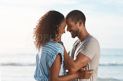 Buy stock photo Smile, couple and forehead touch on beach for marriage romance, loyalty together and bonding with love. Happy, man and woman with relationship support, vacation anniversary and ocean for date outdoor