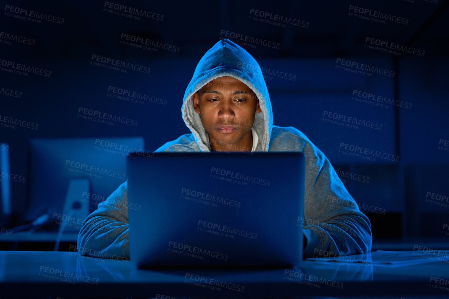 Buy stock photo Black man, hoodie or hacker with laptop for cybersecurity problem, malware or phishing for crime. Programmer, night and software update on technology with dark hacking expert writing algorithm system