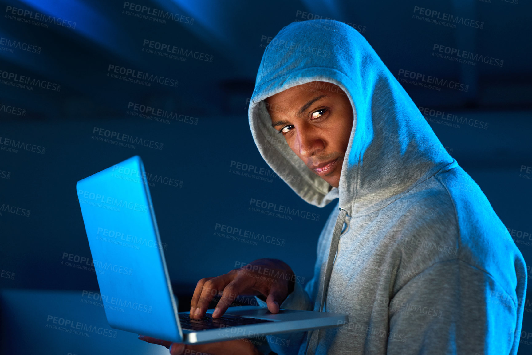 Buy stock photo Portrait, black man or hacker on laptop in night for cybercrime, malware or stealing online data. Programmer, serious and software update for hacking scam, password fraud or theft on website in dark