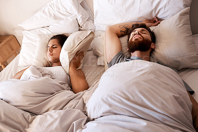 Buy stock photo Bed, snoring and sleeping couple, frustrated woman or person with husband noise, problem and cover ears with pillow. Sleep, insomnia and relax girl with fatigue, tired and exhausted in home bedroom