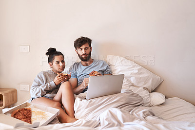 Buy stock photo Hungry couple, pizza and movie on laptop in bed with junk food and streaming series. Eating, computer video and meal in a bedroom at home with man and woman with bonding, online watching and mockup