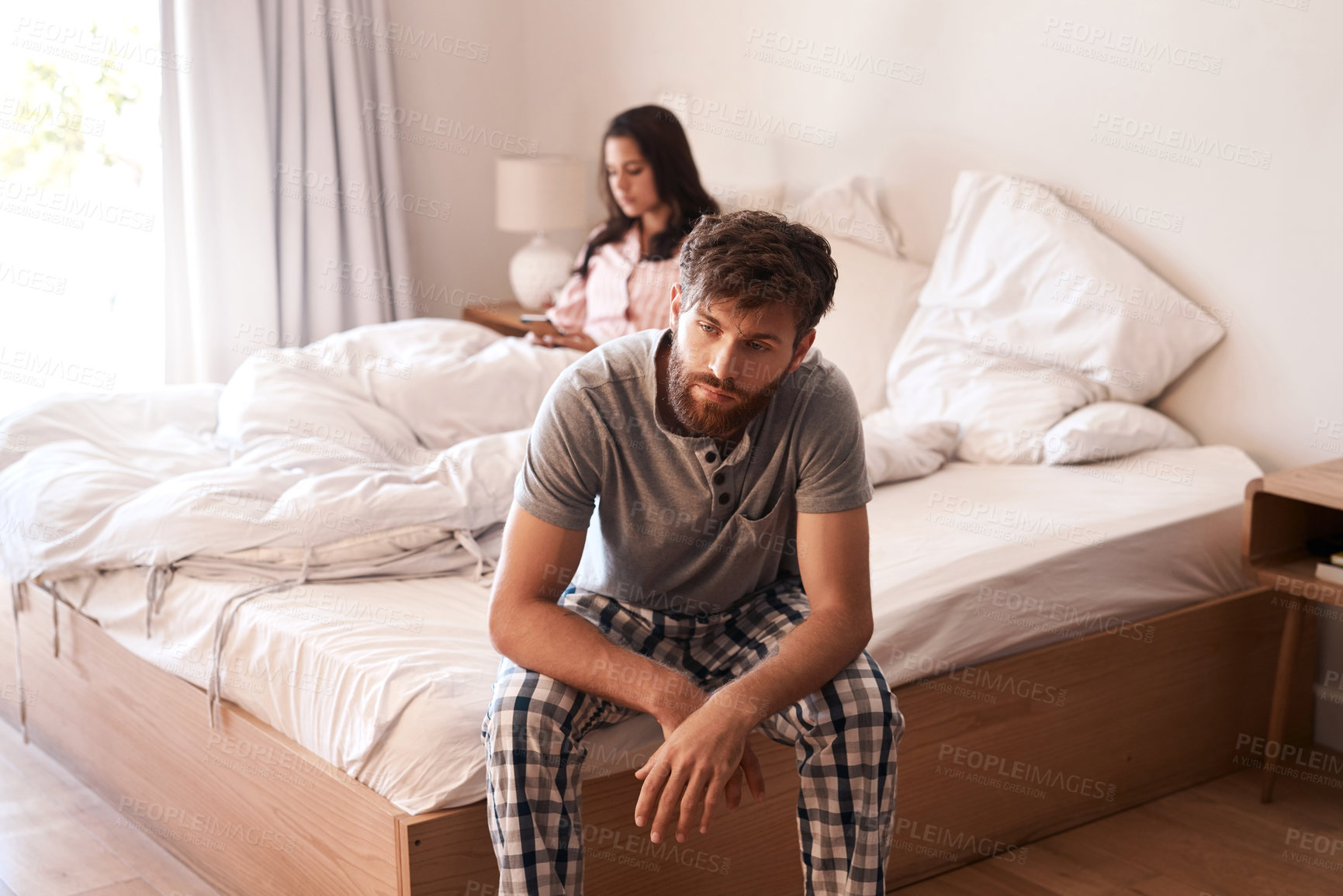 Buy stock photo Home bed, man and couple with problem, marriage conflict or stress over mistake, life fail or insomnia. Mental health risk, mistake and person depressed, sad and thinking about divorce in bedroom