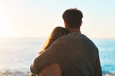 Buy stock photo Love, beach and couple hug at sunset for relaxing, bonding and quality time on romantic date. Nature, travel and man and woman embrace for anniversary or honeymoon on holiday, weekend and vacation