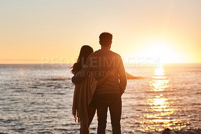 Buy stock photo Sunset, beach and back of couple hug in evening on holiday, summer vacation and weekend by ocean. Nature, love and man and woman embrace, hugging and relax for bonding, quality time and peace by sea