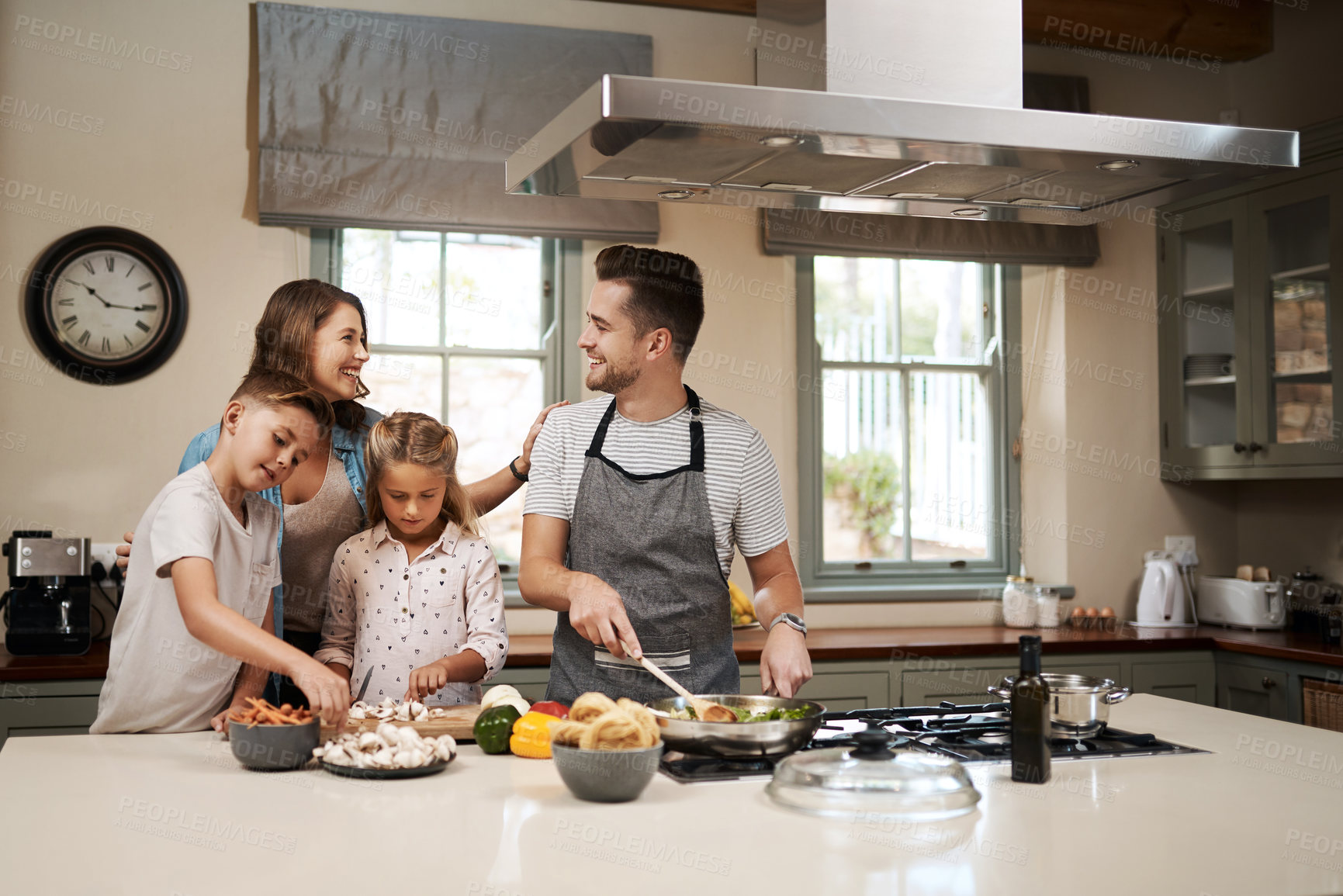 Buy stock photo Cooking, food and children with parents in kitchen for learning, development or skill growth. Happy, bonding and kids with mother and father for preparing dinner, supper or meal together at home.