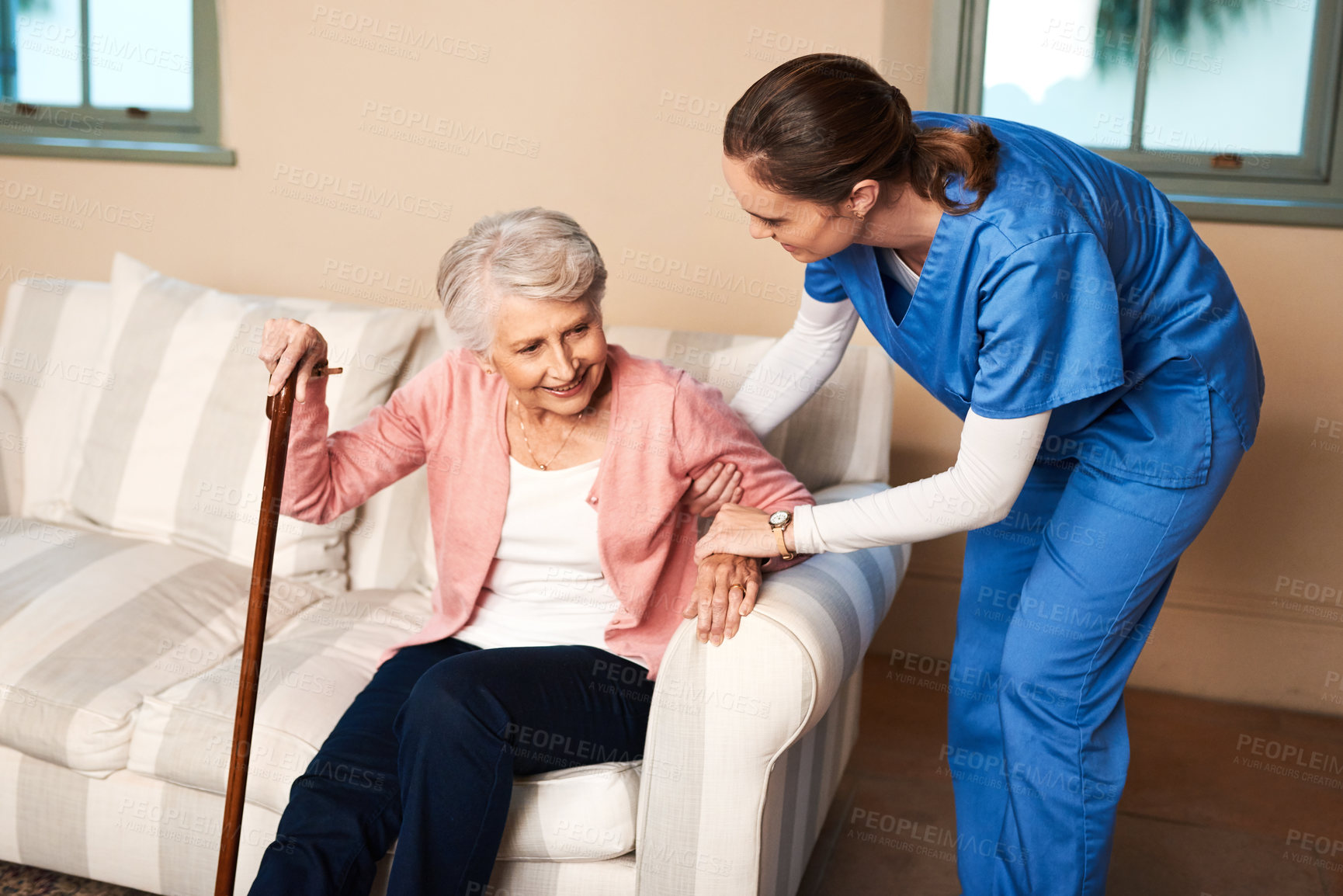 Buy stock photo Caregiver, senior woman and cane on sofa for walking support, help and balance of rehabilitation recovery. People, patient and female person with disability, physiotherapy and mobility on retirement