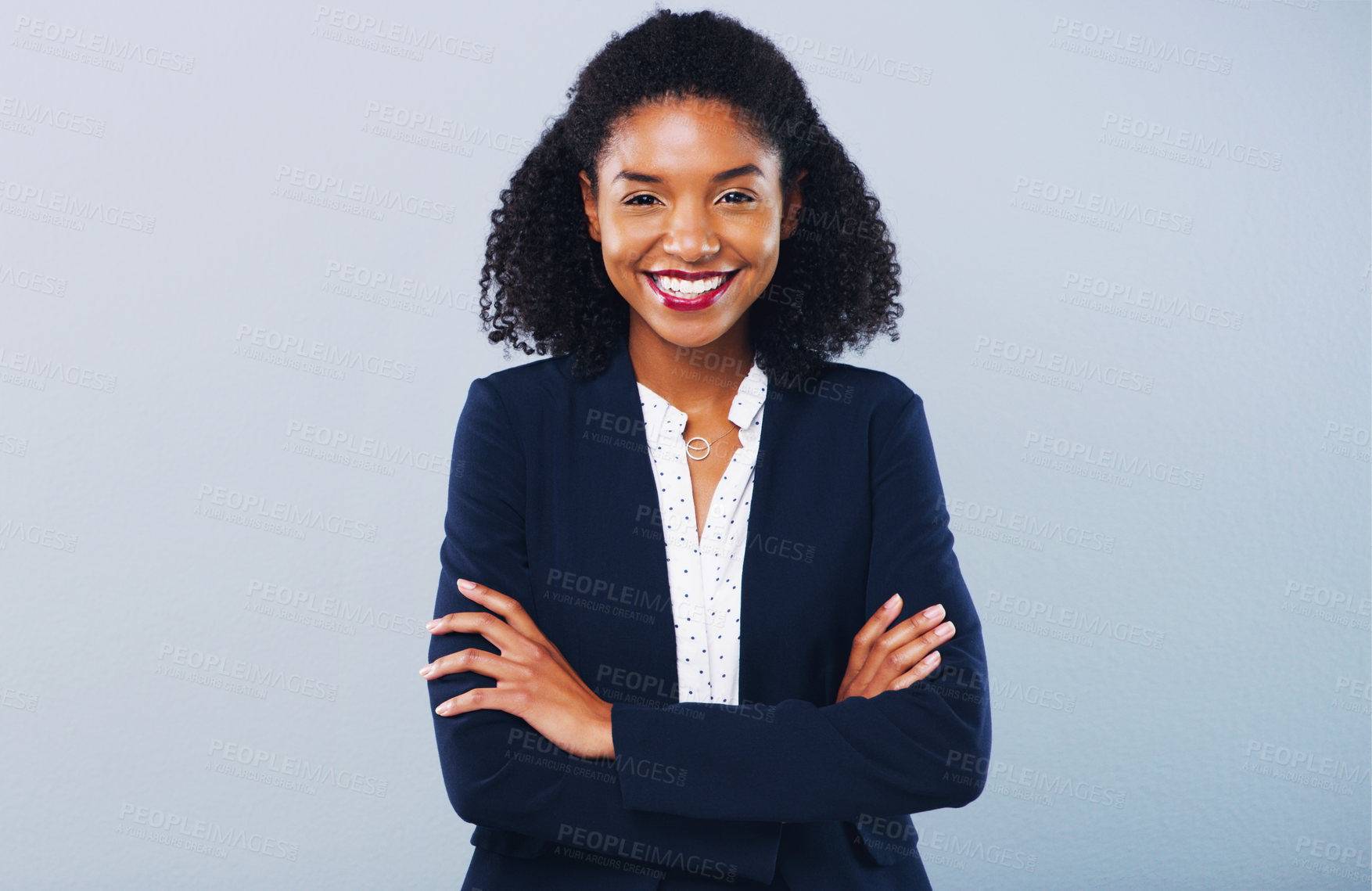 Buy stock photo Studio shot of a confident young businesswoman posing against a grey background