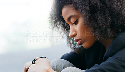 Buy stock photo Shot of a young woman suffering from depression
