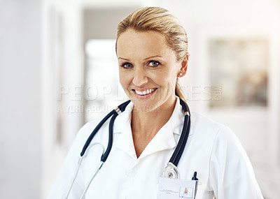 Buy stock photo Mature woman, doctor and happy portrait with hospital, healthcare and clinic professional with confidence. Cardiology, stethoscope and wellness worker with staff and smile at ICU care job as surgeon