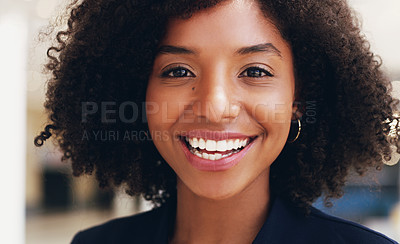 Buy stock photo Cropped portrait of an attractive young businesswoman smiling and standing in the office during the day